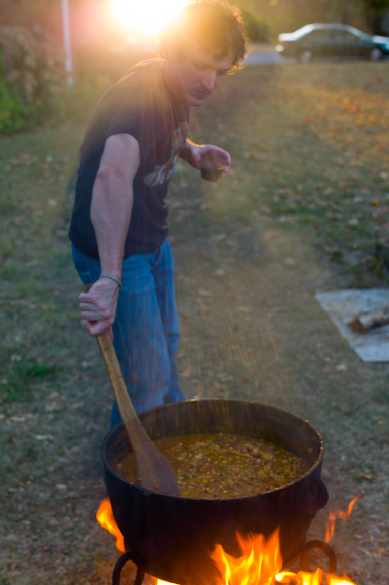 Max stirring the pot of chowder